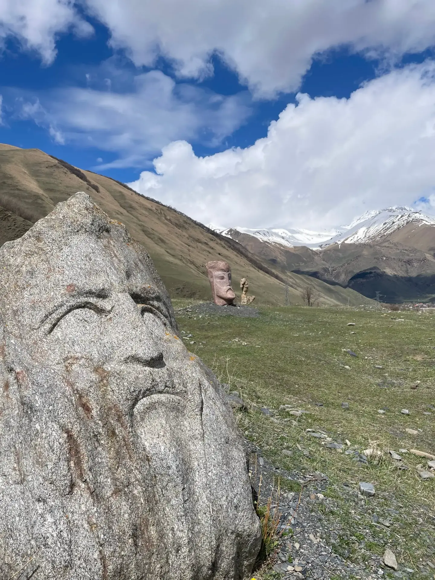 Panoramic Kazbegi valley view with Caucasus peaks on a Georgia tour package